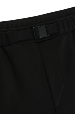 Pantalones de ch&aacute;ndal de forro polar aglomerado con detalle de logo, Negro