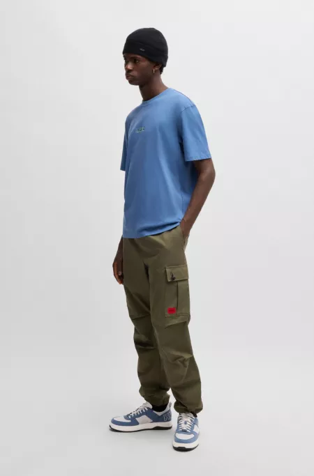 Mixed-material trainers with two sets of laces