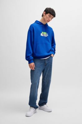 HUGO - Cotton-terry hoodie with spray-paint graphic - Light Blue