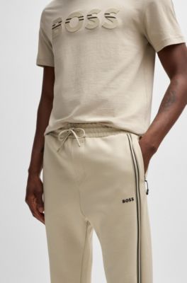 Pantalones de ch&aacute;ndal de algod&oacute;n con apliques de cinta, Beige claro