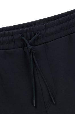 Pantalones de ch&aacute;ndal de algod&oacute;n con apliques de cinta, Azul oscuro