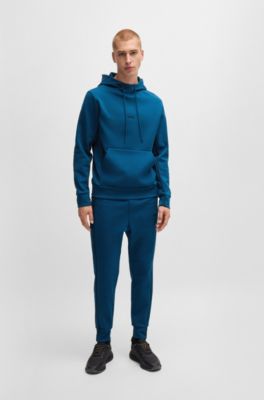 Pantalones de ch&aacute;ndal de algod&oacute;n con apliques de cinta, Celeste