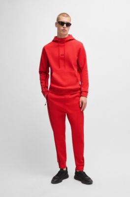 Pantalones de ch&aacute;ndal de algod&oacute;n con apliques de cinta, Rojo claro