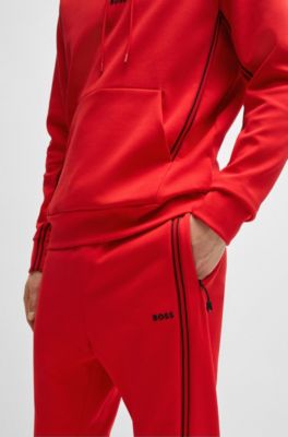 Pantalones de ch&aacute;ndal de algod&oacute;n con apliques de cinta, Rojo claro