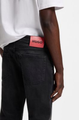 Jeans extra slim fit de denim el&aacute;stico negro, Negro