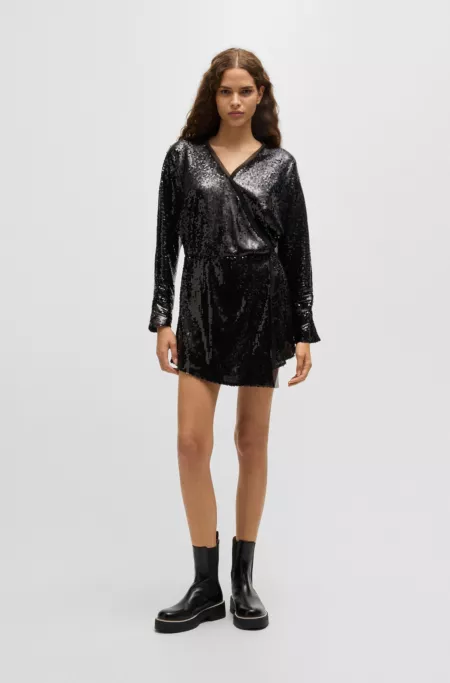 Sequinned jumpsuit with wrap front