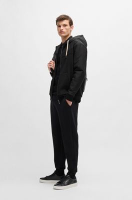 Sudadera de algod&oacute;n con capucha y cremallera con aplique tonal, Negro