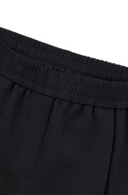 Pantalon habill&eacute; en tissu stretch, Noir