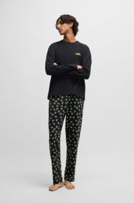 Stretch-cotton pajamas with 70s film graphics, Black