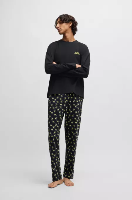 Stretch-cotton pajamas with 70s film graphics