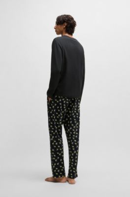Stretch-cotton pajamas with 70s film graphics, Black