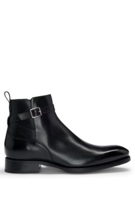 Leather jodhpur boots with zip closure and buckled strap, Black