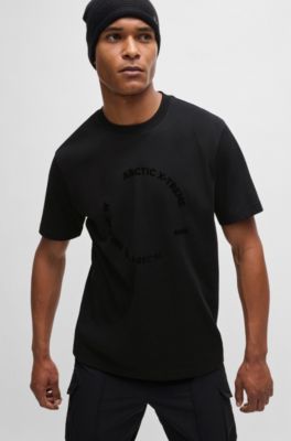 Camiseta relaxed fit de punto de algod&oacute;n con dise&ntilde;o de temporada, Negro