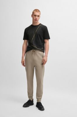 Camiseta regular fit de algod&oacute;n interlock con ilustraci&oacute;n de l&iacute;neas finas, Negro