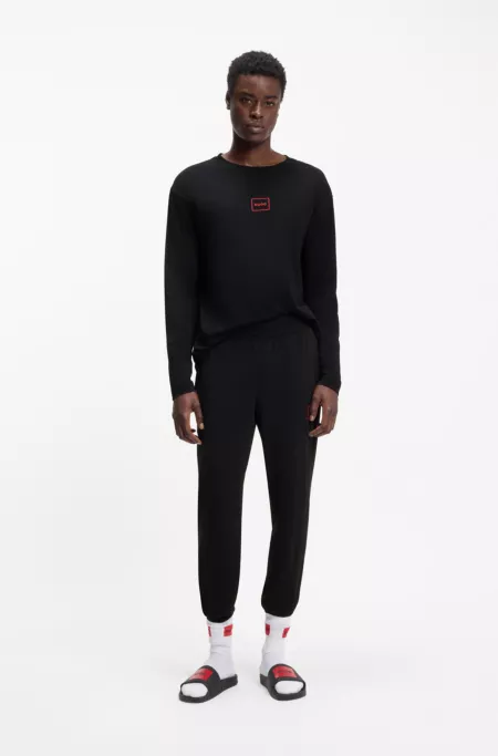 Logo-print tracksuit bottoms in stretch cotton