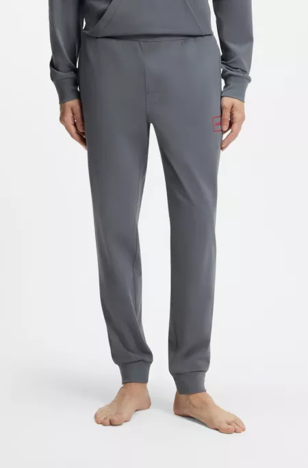 Cuffed loungewear pants in stretch cotton with logo print