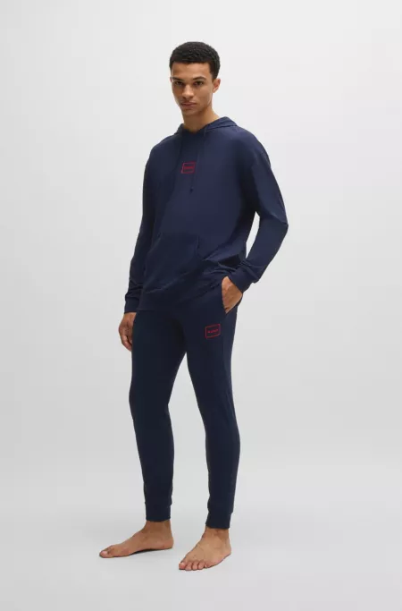 Logo-print tracksuit bottoms in stretch cotton
