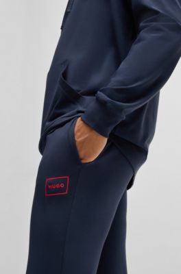 Logo-print tracksuit bottoms in stretch cotton, Dark Blue