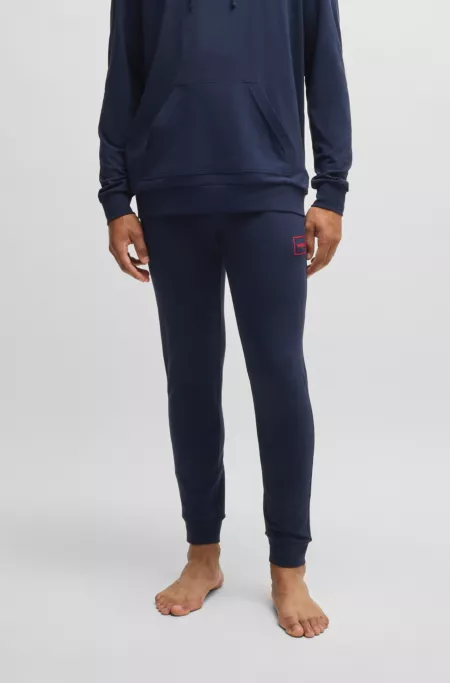 Logo-print tracksuit bottoms in stretch cotton