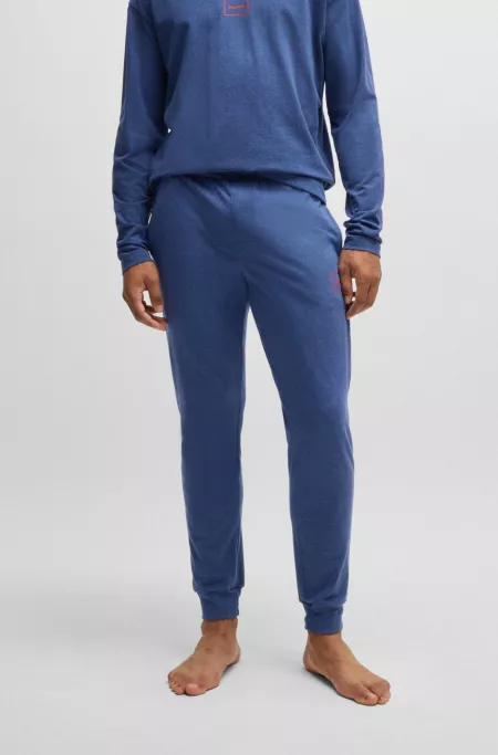 Logo-print tracksuit bottoms in stretch cotton