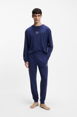 Pantalones de ropa de sal&oacute;n en algod&oacute;n el&aacute;stico con pu&ntilde;os y logo estampado, Azul oscuro