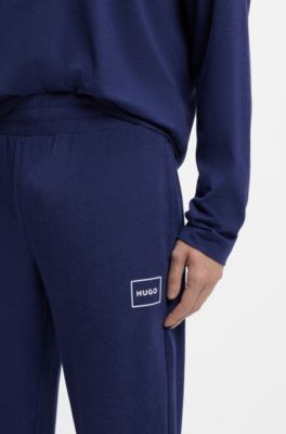 Pantalones de ropa de sal&oacute;n en algod&oacute;n el&aacute;stico con pu&ntilde;os y logo estampado, Azul oscuro