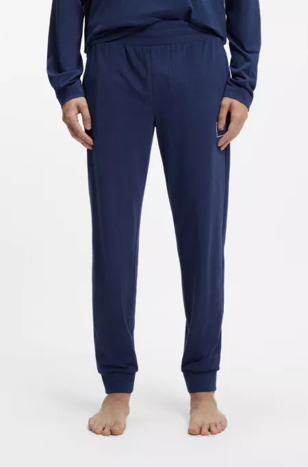 Logo-print tracksuit bottoms in stretch cotton