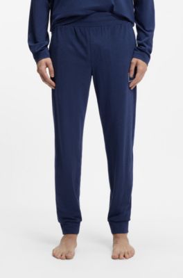 Pantalones de ropa de sal&oacute;n en algod&oacute;n el&aacute;stico con pu&ntilde;os y logo estampado, Azul oscuro