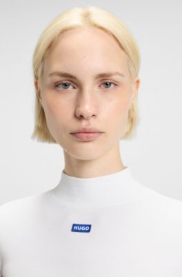 Parte superior de algod&oacute;n el&aacute;stico con cuello alto e insignia con logo, Blanco