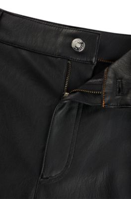 Pantalones loose fit de pernera ancha en piel sint&eacute;tica, Negro