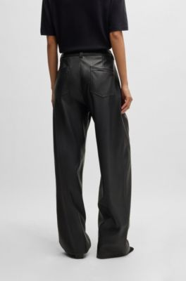 Pantalones loose fit de pernera ancha en piel sint&eacute;tica, Negro