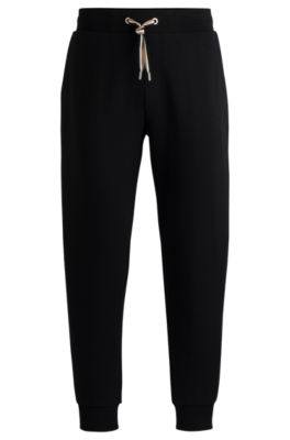 Hugo Boss Tracksuit Bottoms With Signature-stripe Cords In Black