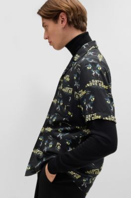 Camisa relaxed fit con gr&aacute;ficos de pel&iacute;culas de los 70, Negro