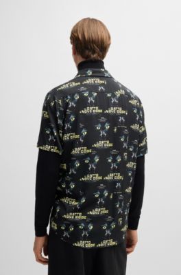 Camisa relaxed fit con gr&aacute;ficos de pel&iacute;culas de los 70, Negro