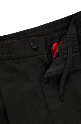 Pantalones de corte moderno HUGO&nbsp;x&nbsp;Les Benjamins en jacquard con estampado, Fantas&iacute;a