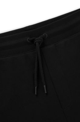 Cotton-terry relaxed-fit shorts with logo trim, Black