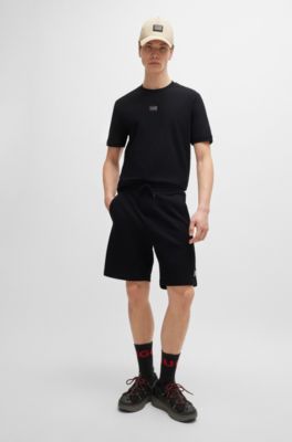 Cotton-terry relaxed-fit shorts with logo trim, Black