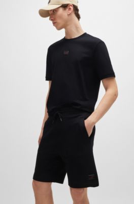 Cotton-terry relaxed-fit shorts with logo trim, Black