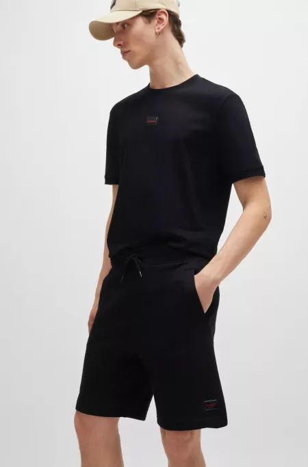 Cotton-terry relaxed-fit shorts with logo trim