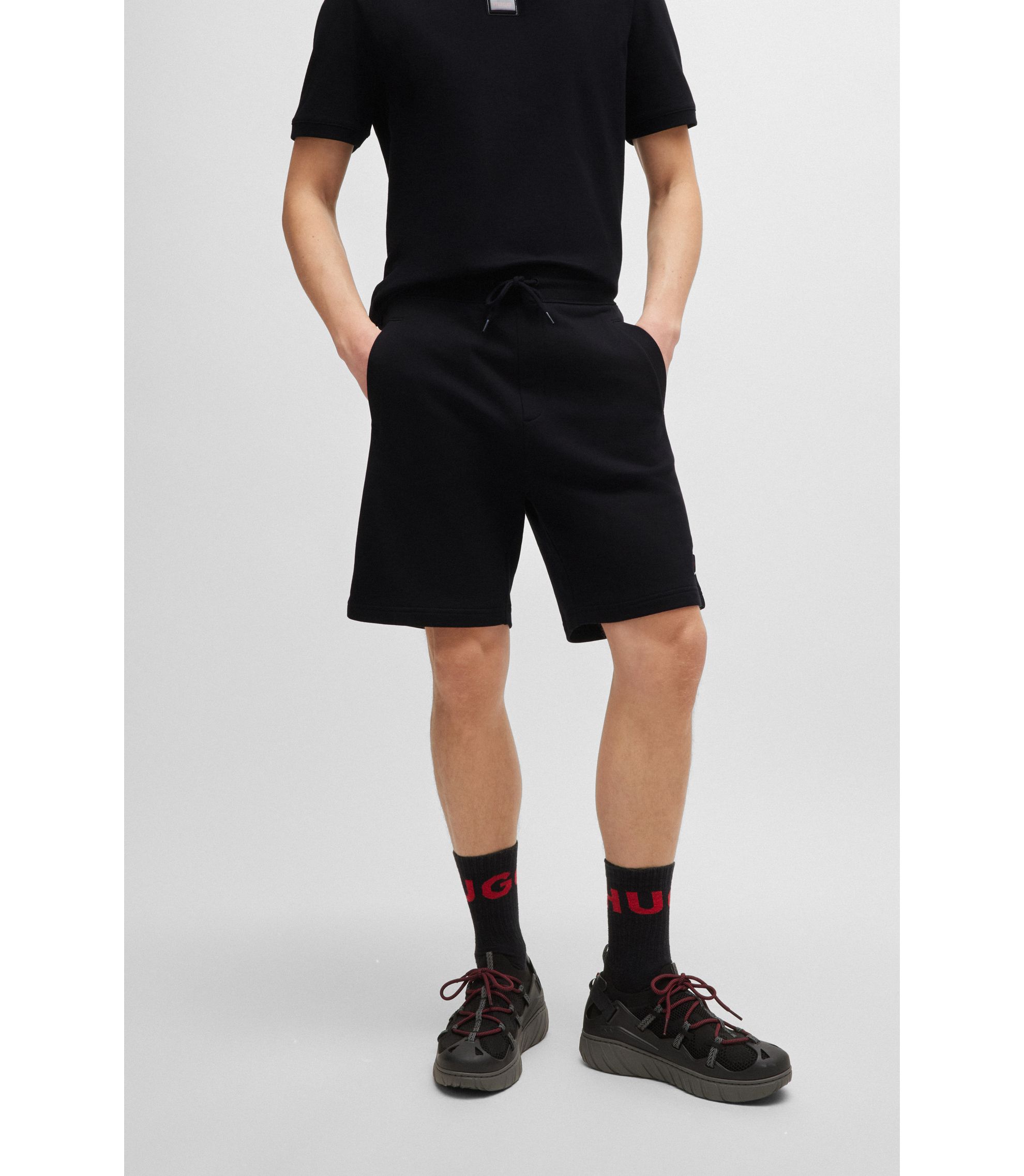 HUGO - Cotton-terry relaxed-fit shorts with logo trim - Black