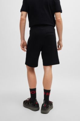 Cotton-terry relaxed-fit shorts with logo trim, Black