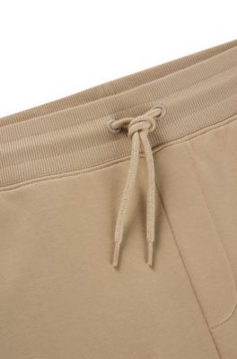 Cotton-terry relaxed-fit shorts with logo trim, Light Beige