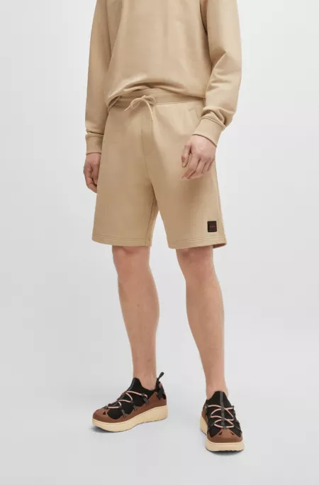 Cotton-terry relaxed-fit shorts with logo trim