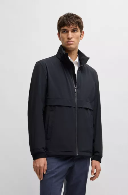 Softshell jacket in washable stretch fabric with packable hood