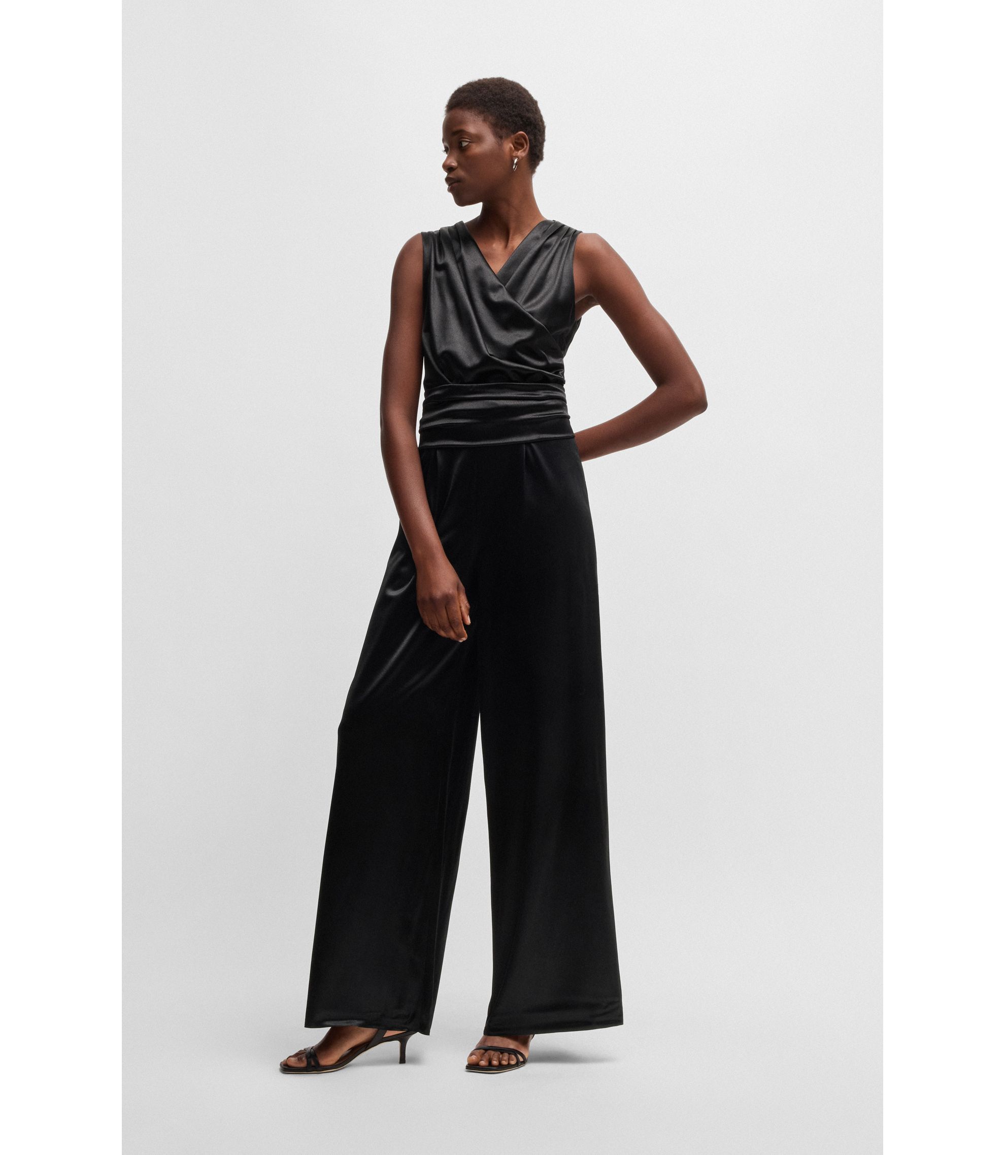 BOSS Sleeveless jumpsuit in lustrous jersey with wrap front Black - Main Image