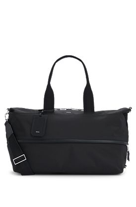 Expandable holdall with signature trims