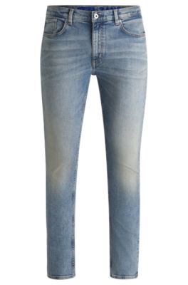 Extra-slim-fit jeans in stonewashed blue stretch denim, Blue