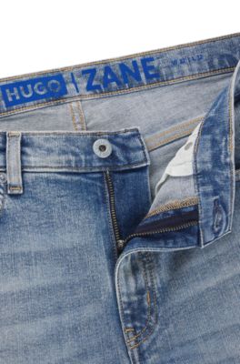 Extra-slim-fit jeans in stonewashed blue stretch denim, Blue