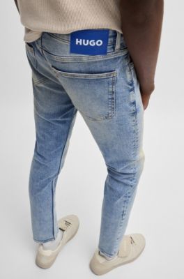 Extra-slim-fit jeans in stonewashed blue stretch denim, Blue