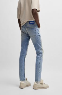 Extra-slim-fit jeans in stonewashed blue stretch denim, Blue